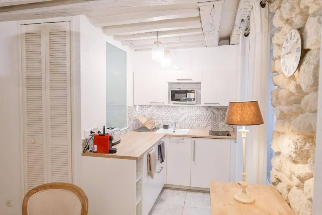 Cosy Appartement En Plein Marais باريس المظهر الخارجي الصورة